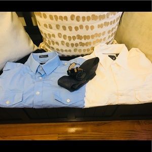 Bundle of two long sleeve dress shirts for men.